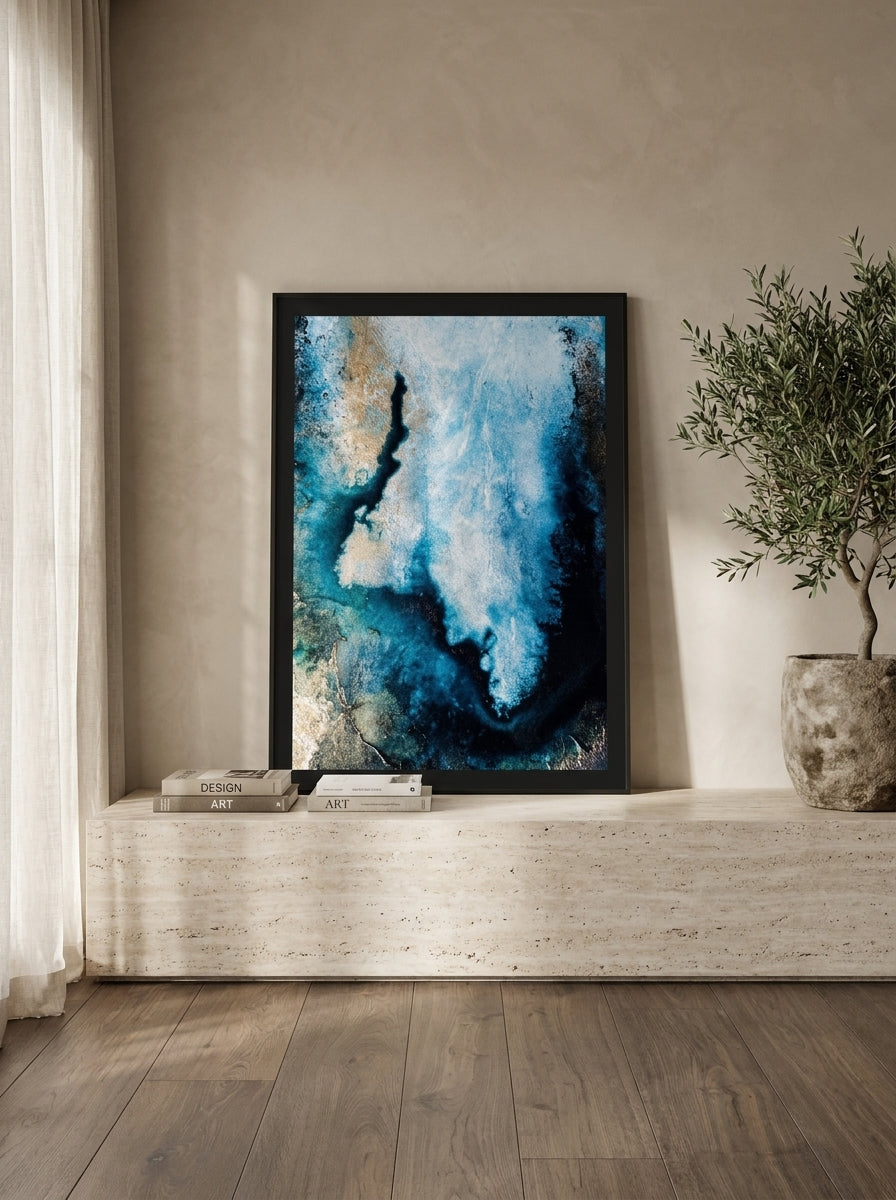 Modern wall art print standing on a console in a luxe home office