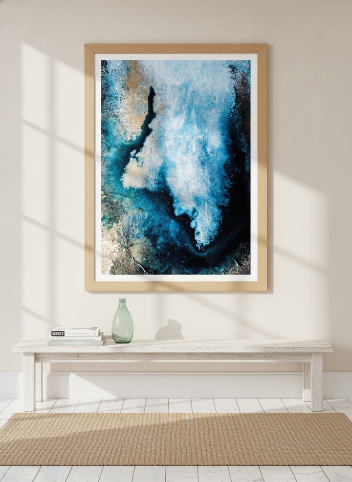 Modern wall art print styled on the wall in a coastal living room
