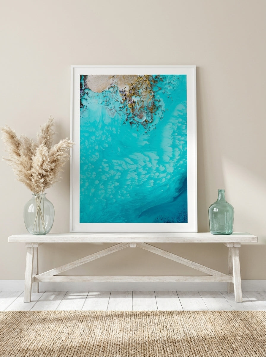 Modern wall art print standing on a console in a coastal living room