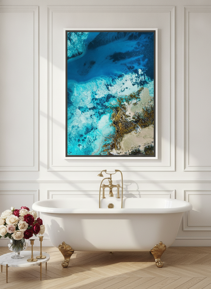 Canvas wall art with a white surround styled on the wall in a Parisian bathroom