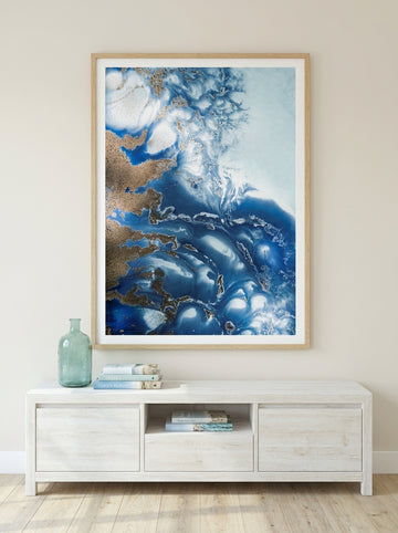 Modern wall art print styled on the wall in a coastal living room