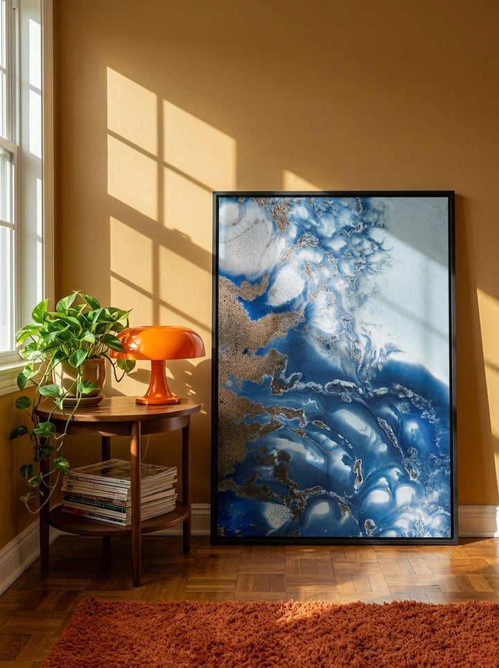 Canvas wall art with a black surround leaning against the wall in a retro 70s bedroom