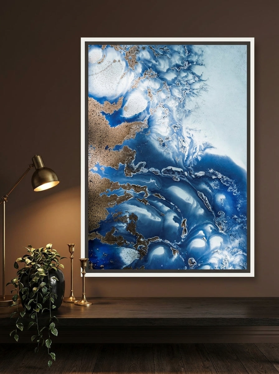 Canvas wall art with a white surround styled on the wall in a moody home office