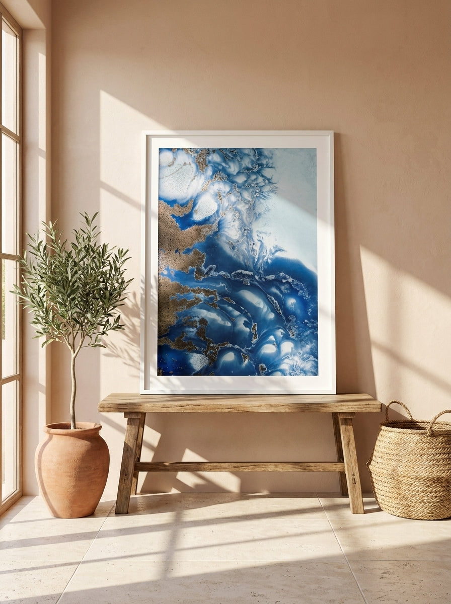 Modern wall art print standing on a bench in a Mediterranean bedroom