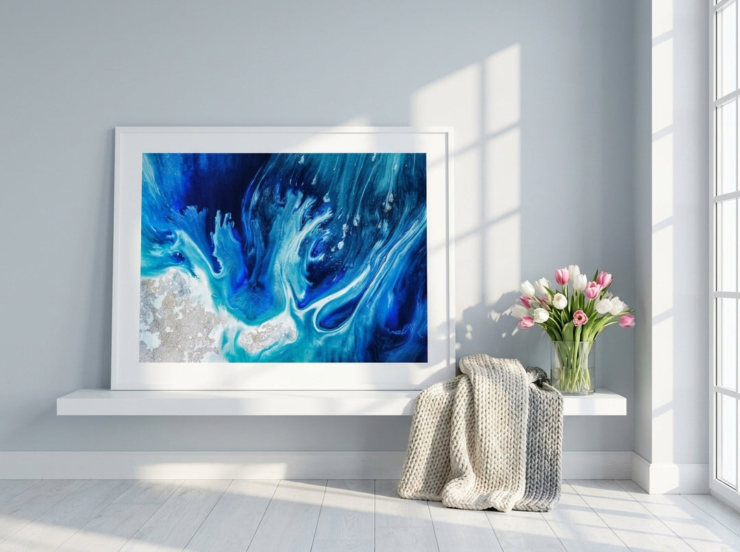 Modern wall art print standing on a shelf in a bright Scandinavian home office