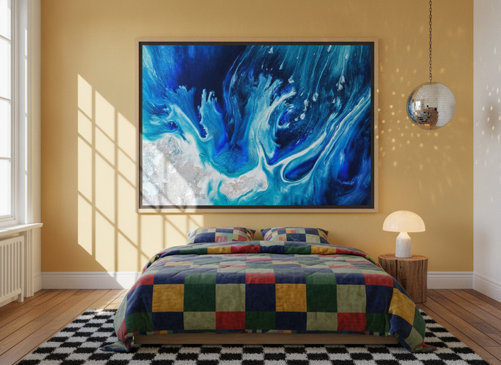 Oversized statement canvas wall art with a natural timber surround styled on the wall in a colourful eclectic bedroom