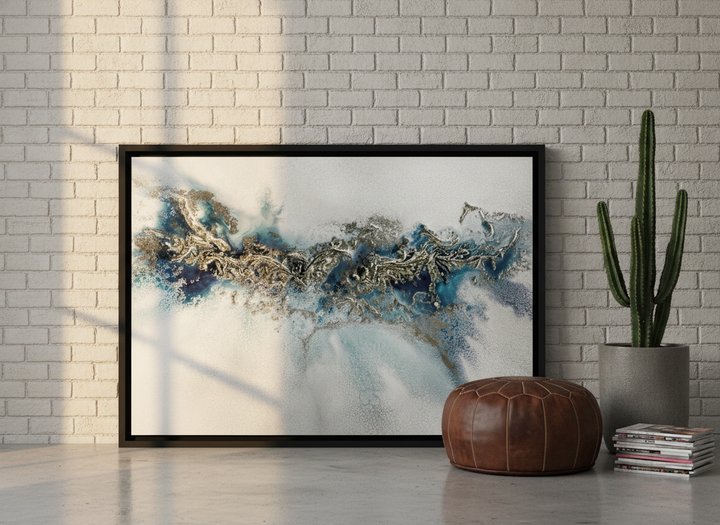 Canvas wall art with a black surround leaning against the wall in an industrial loft home office