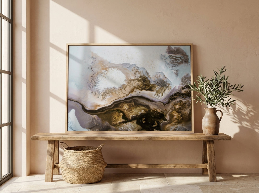 Modern wall art print standing on a bench in a Mediterranean bedroom