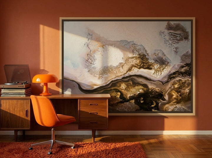 Canvas wall art with a natural timber surround styled on the wall in a retro 70s home office