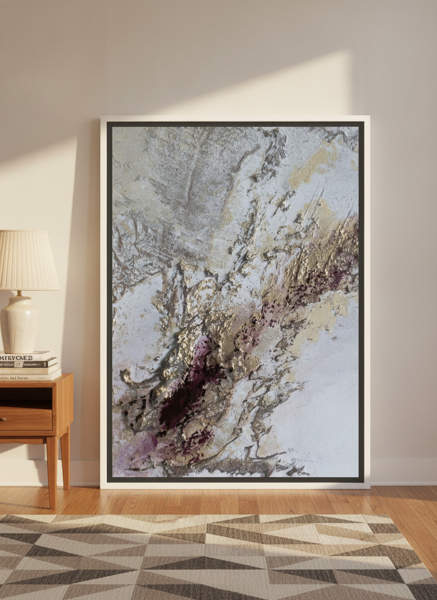 Oversized statement canvas wall art with a white surround leaning against the wall in a mid-century dining room