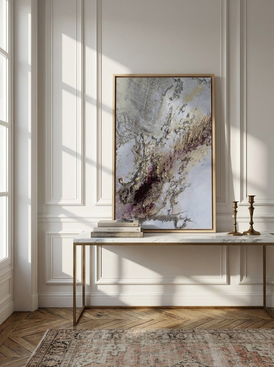 Canvas wall art with a natural timber surround standing on a console in a Parisian bedroom