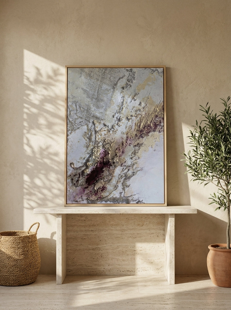 Modern wall art print standing on a console in a Mediterranean home office