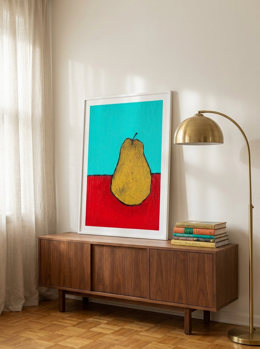 Modern wall art print standing on a sideboard in a mid-century living room
