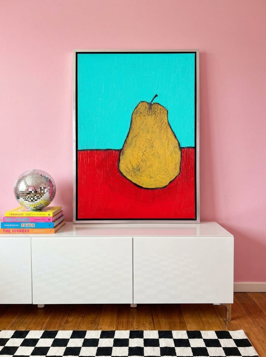 Canvas wall art with a silver leaf surround standing on a sideboard in a colourful eclectic dining room