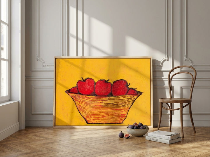 Oversized statement canvas wall art with a natural timber surround leaning against the wall in a Parisian dining room