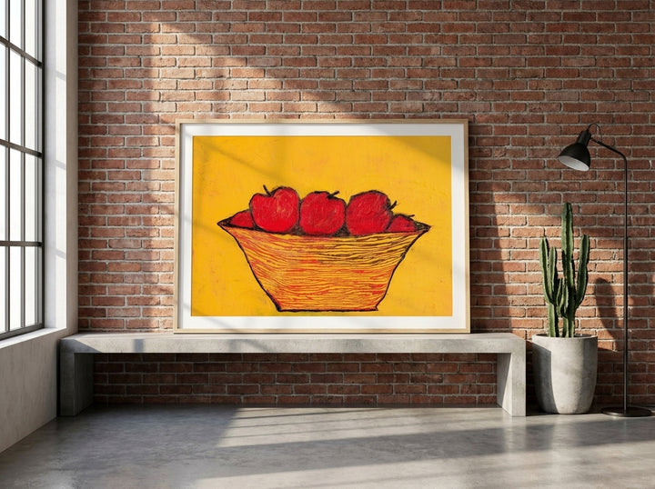 Modern wall art print standing on a kitchen bench in an industrial loft kitchen