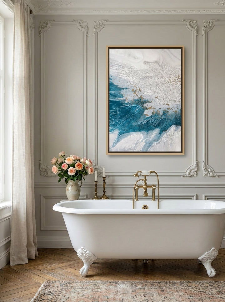 Canvas wall art with a natural timber surround styled on the wall in a Parisian bathroom