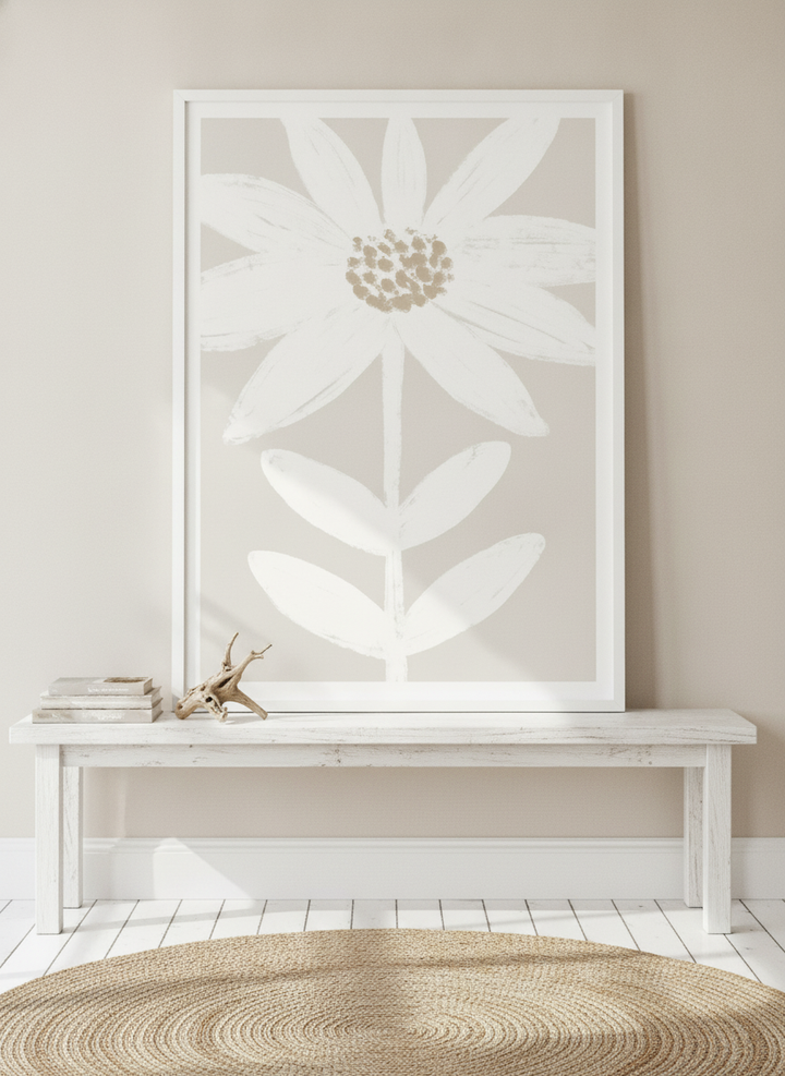 Modern wall art print standing on a console in a coastal bathroom