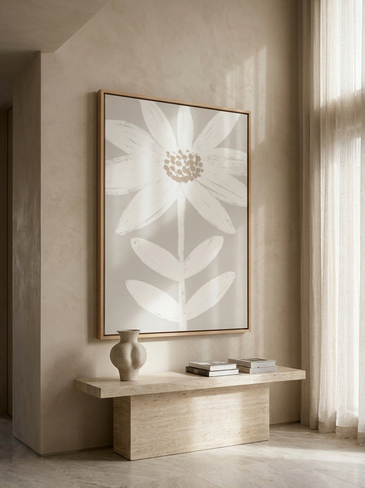 Oversized statement canvas wall art with a natural timber surround styled on the wall in a luxe living room