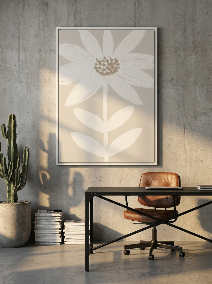 Canvas wall art with a white surround styled on the wall in an industrial loft home office