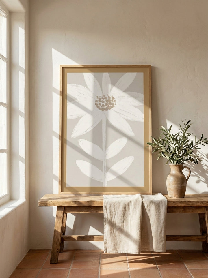 Modern wall art print standing on a bench in a Mediterranean home office