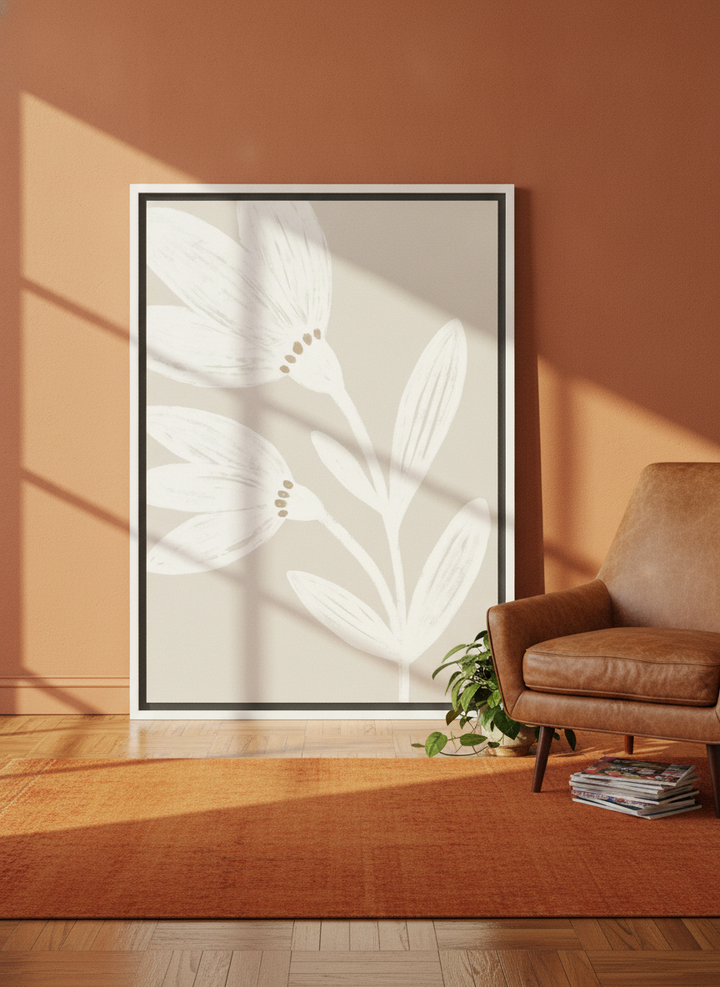 Canvas wall art with a white surround leaning against the wall in a retro 70s home office