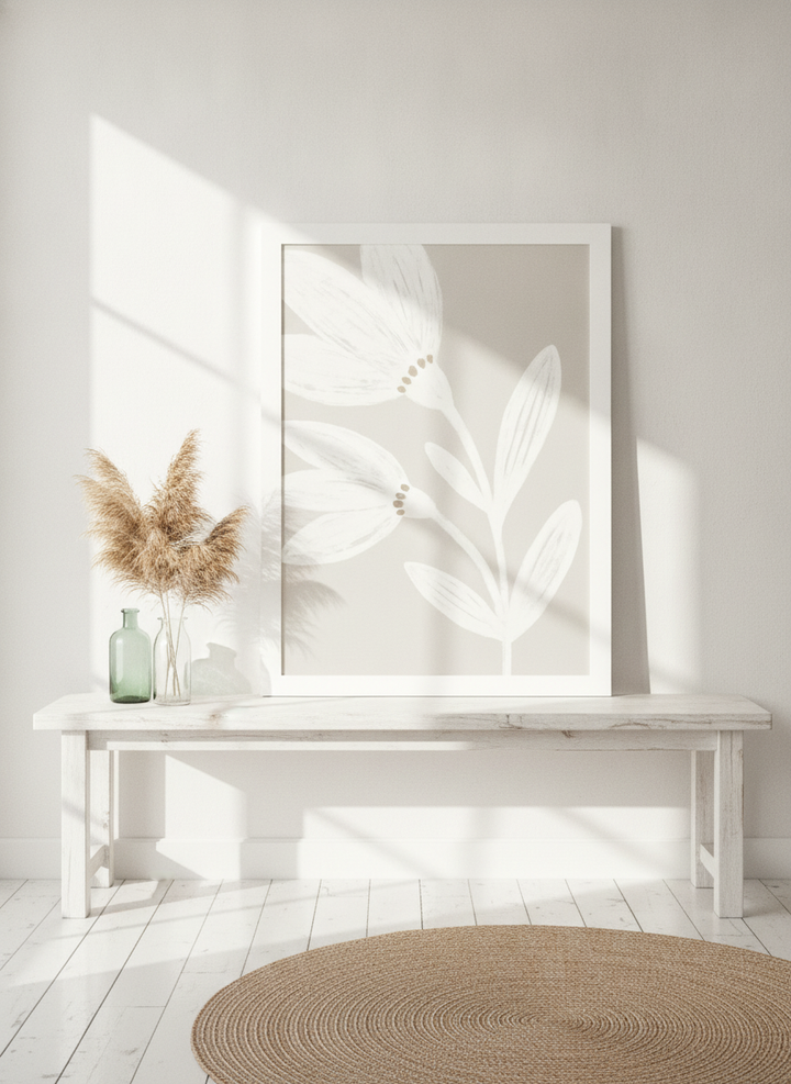 Modern wall art print standing on a console in a coastal bathroom