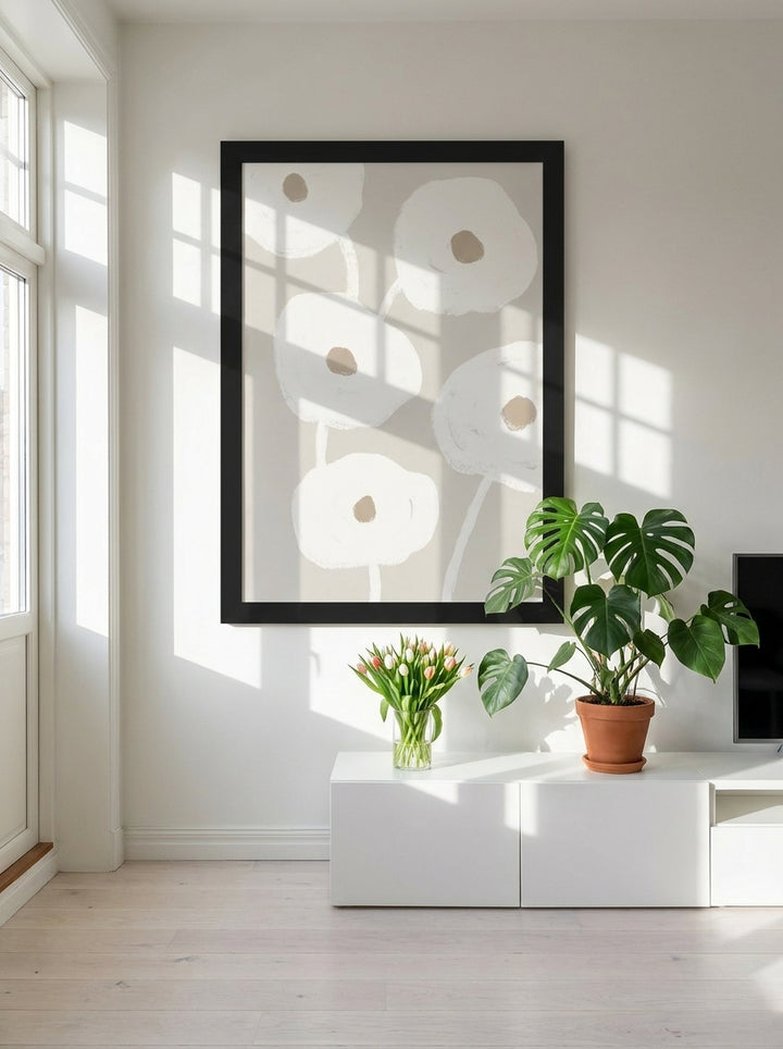 Oversized statement modern wall art print styled on the wall in a bright Scandinavian living room