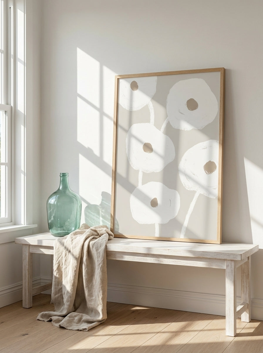 Modern wall art print standing on a console in a coastal home office
