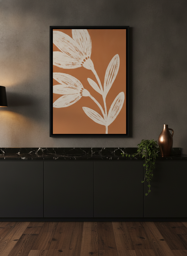 Canvas wall art with a black surround styled on the wall in a moody kitchen