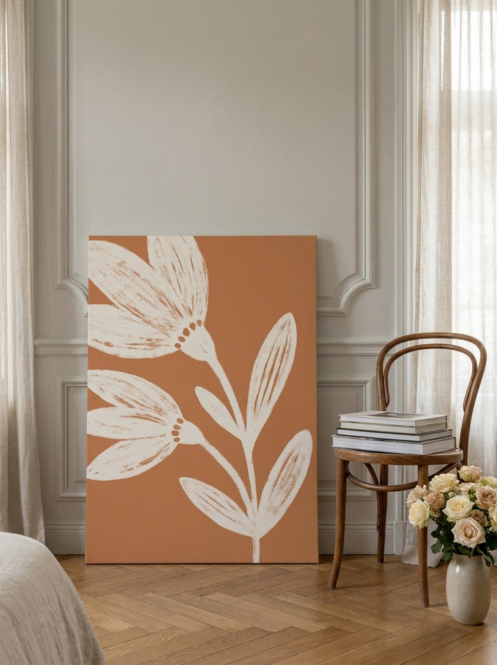 Stretched canvas wall art leaning against the wall in a Parisian bedroom
