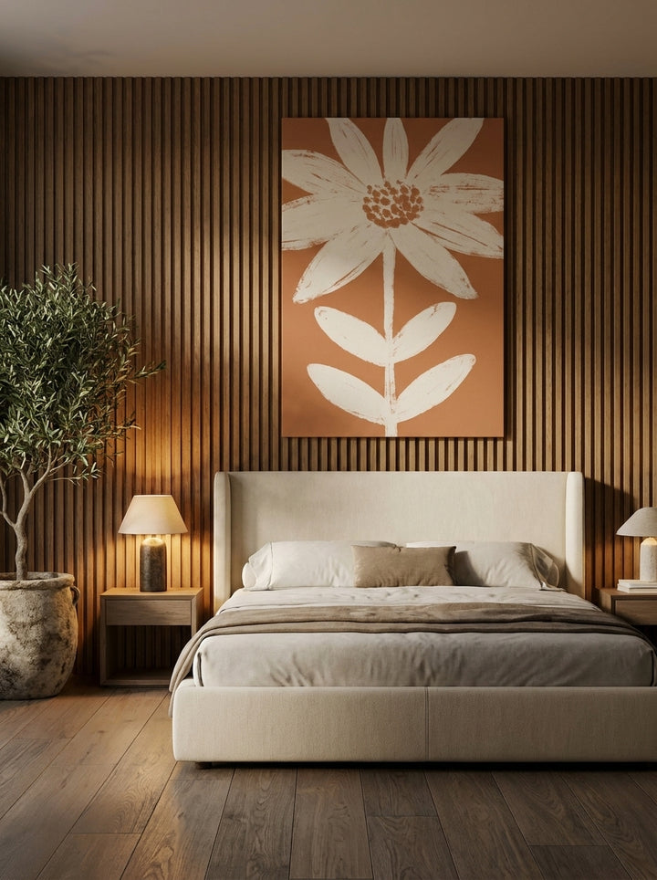Stretched canvas wall art styled on the wall in a luxe bedroom
