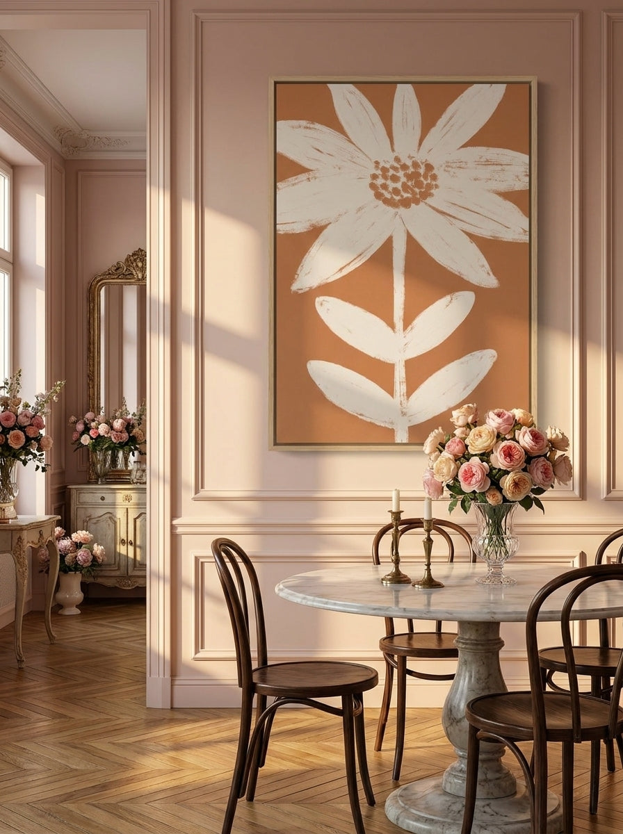 Oversized statement canvas wall art with a natural timber surround styled on the wall in a Parisian dining room