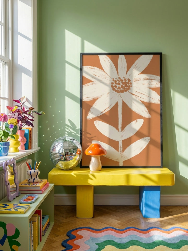 Modern wall art print standing on a side table in a colourful eclectic home office