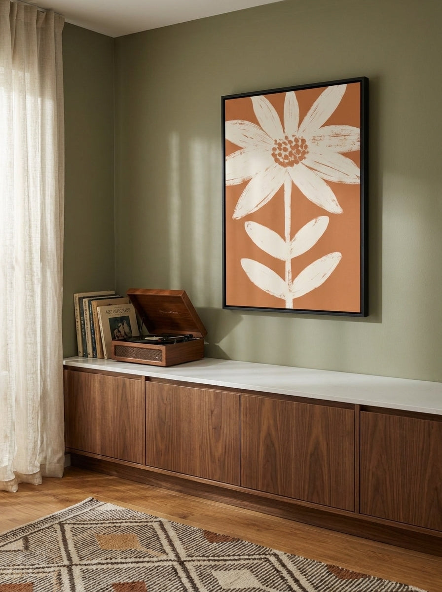 Canvas wall art with a black surround styled on the wall in a mid-century kitchen