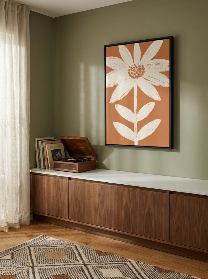 Canvas wall art with a black surround styled on the wall in a mid-century kitchen