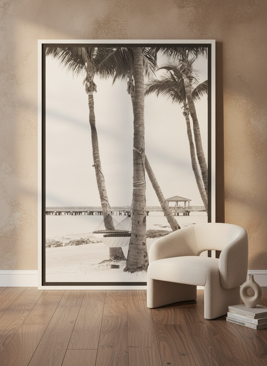 Oversized statement canvas wall art with a white surround leaning against the wall in a luxe bedroom