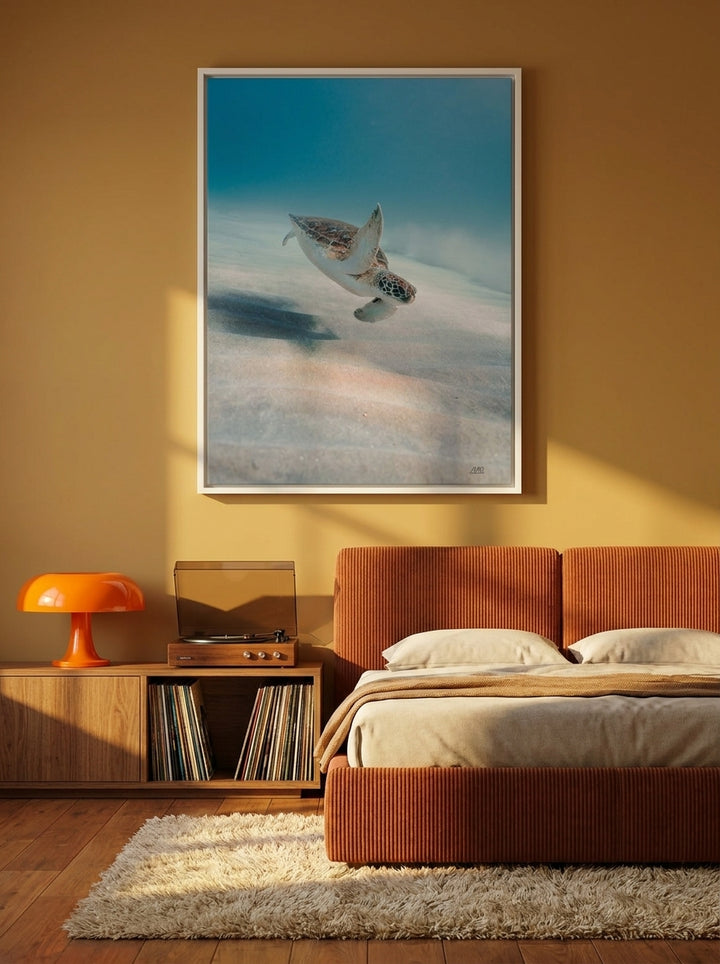 Canvas wall art with a white surround styled on the wall in a retro 70s bedroom