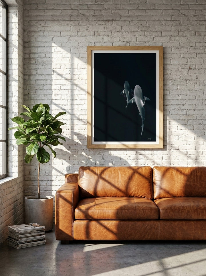 Modern wall art print styled on the wall in an industrial loft living room