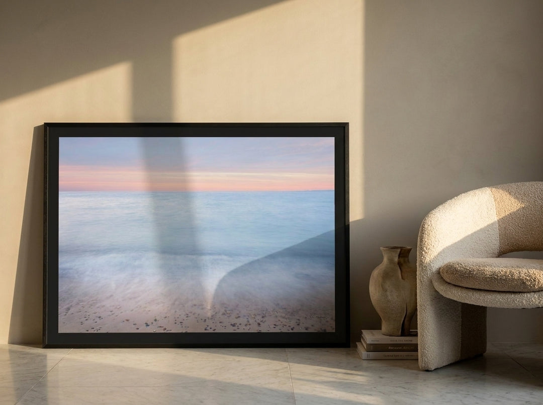 Modern wall art print leaning against the wall in a luxe home office