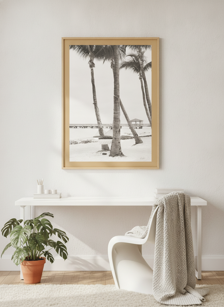 Modern wall art print styled on the wall in a bright Scandinavian home office