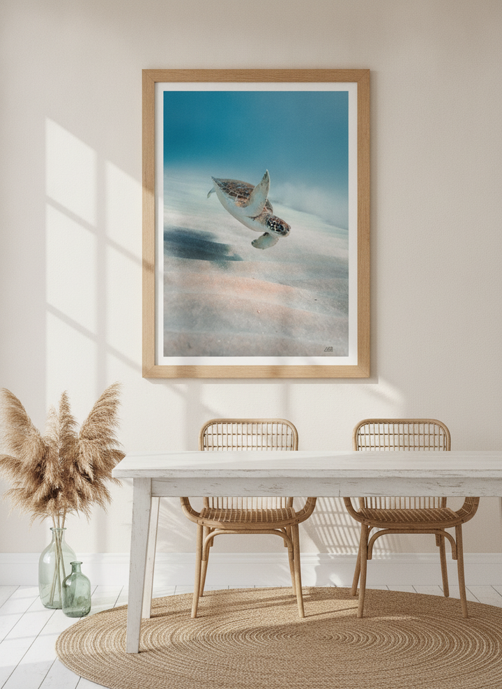 Modern wall art print styled on the wall in a coastal dining room