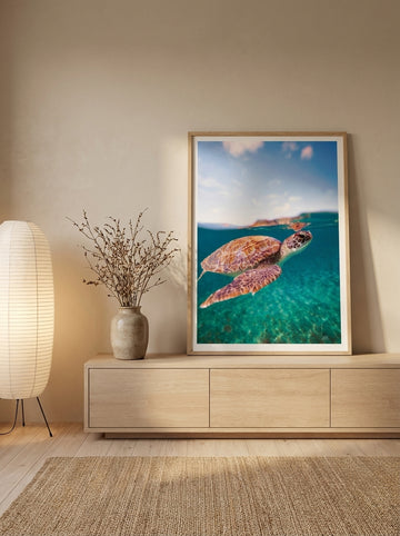 Modern wall art print standing on a sideboard in a warm Japandi bedroom
