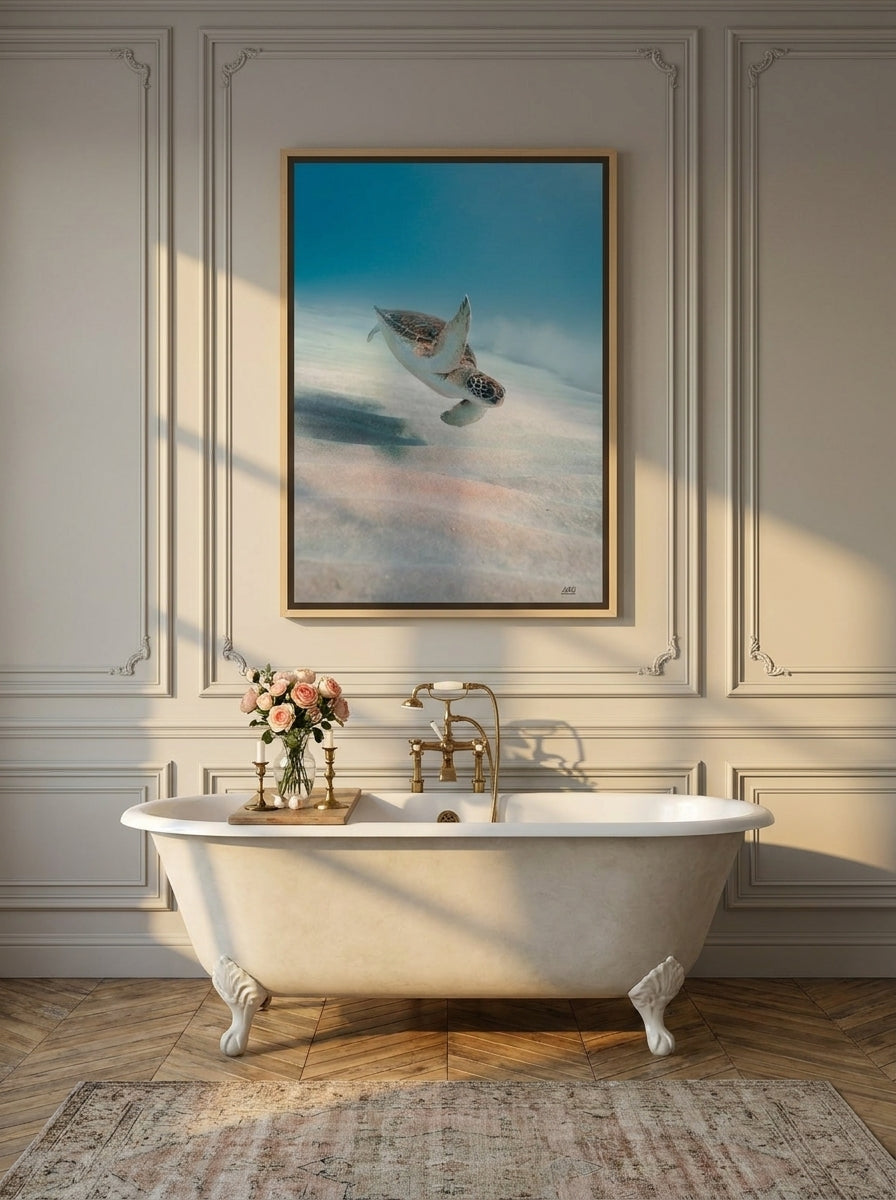 Canvas wall art with a natural timber surround styled on the wall in a Parisian bathroom