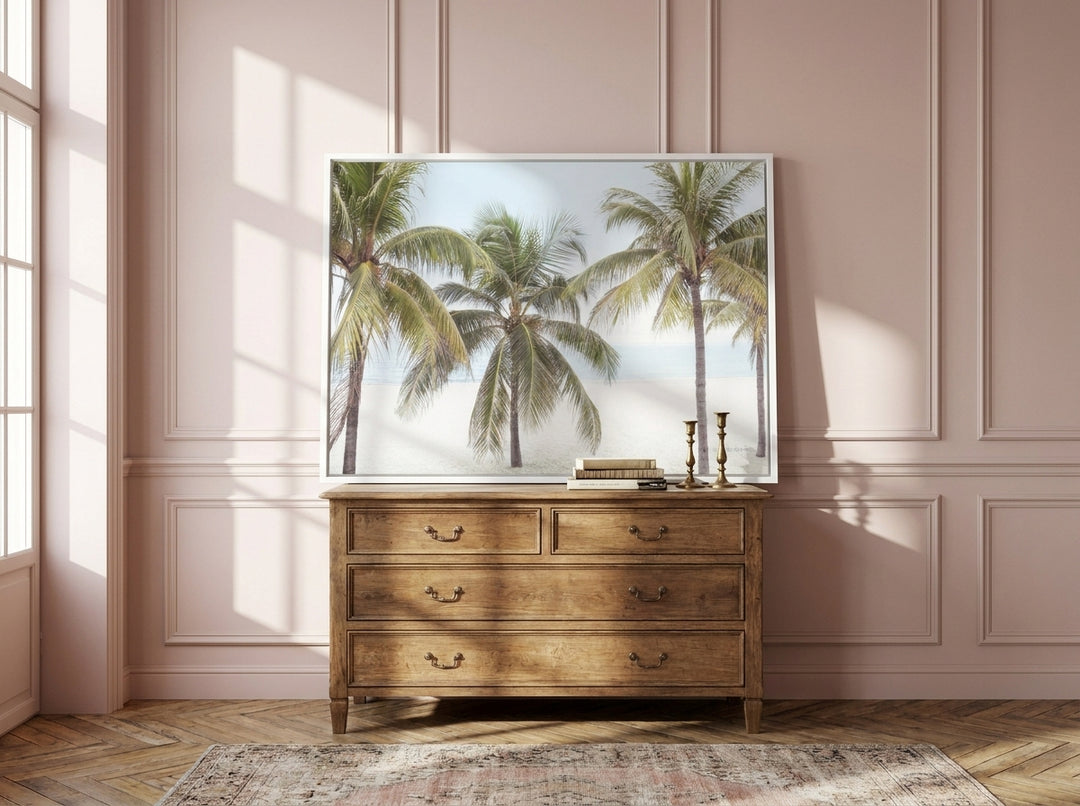 Canvas wall art with a white surround standing on a sideboard in a Parisian bathroom