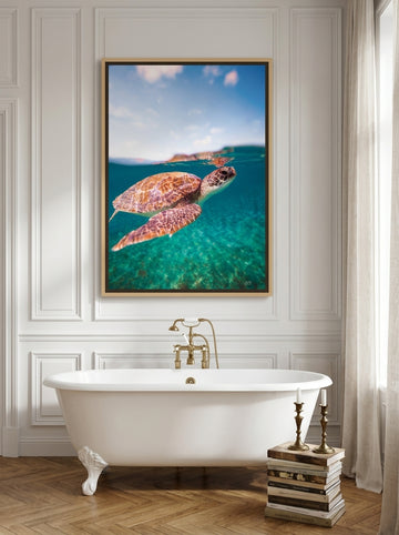 Canvas wall art with a natural timber surround styled on the wall in a Parisian bathroom