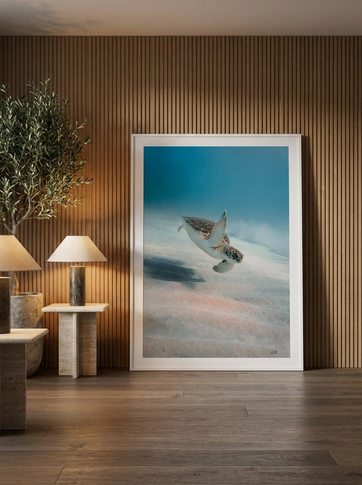 Oversized statement modern wall art print leaning against the wall in a luxe dining room