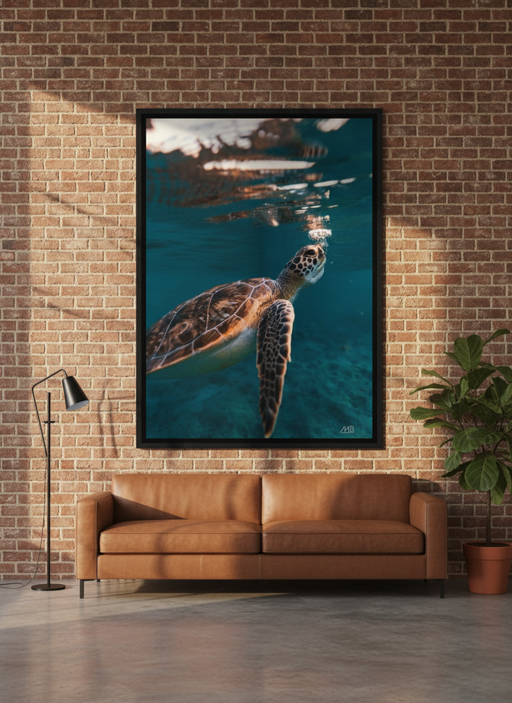 Oversized statement canvas wall art with a black surround styled on the wall in an industrial loft living room