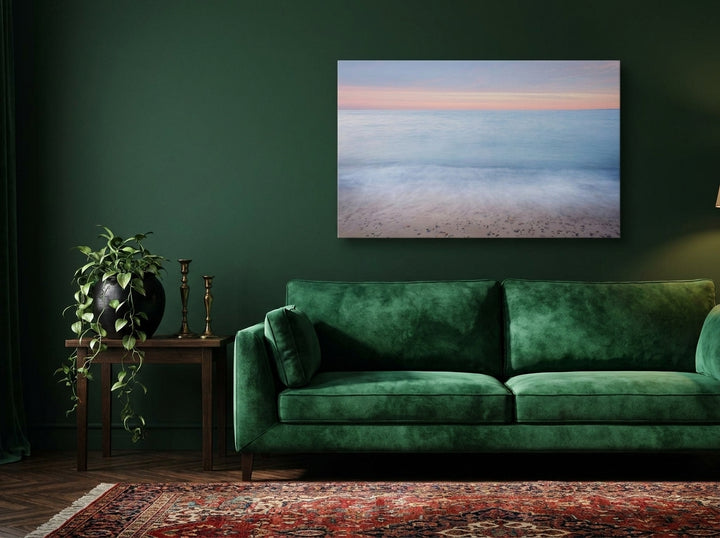Stretched canvas wall art styled on the wall in a moody living room