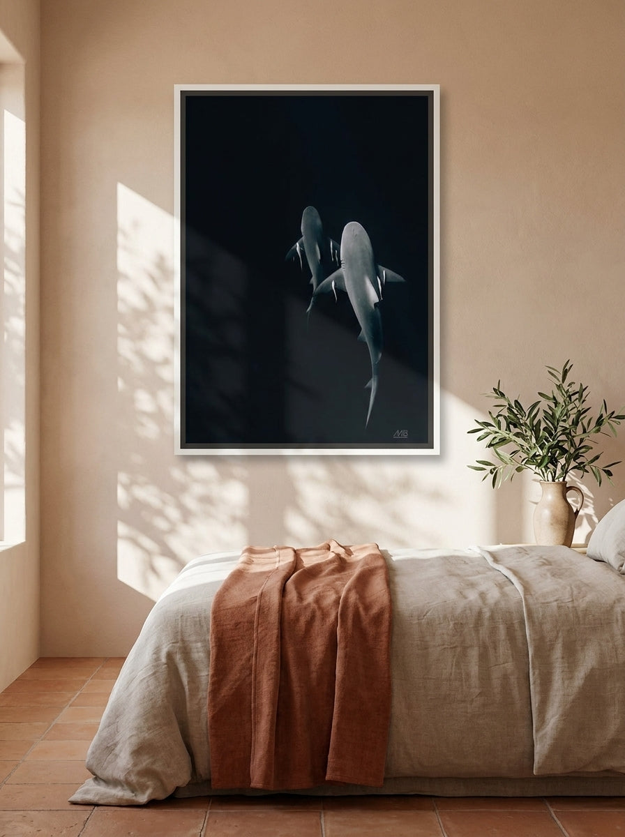 Canvas wall art with a white surround styled on the wall in a Mediterranean bedroom